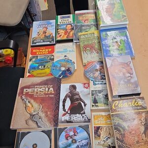 9 Books And 11 Movies a collection of home video media DVDs & books